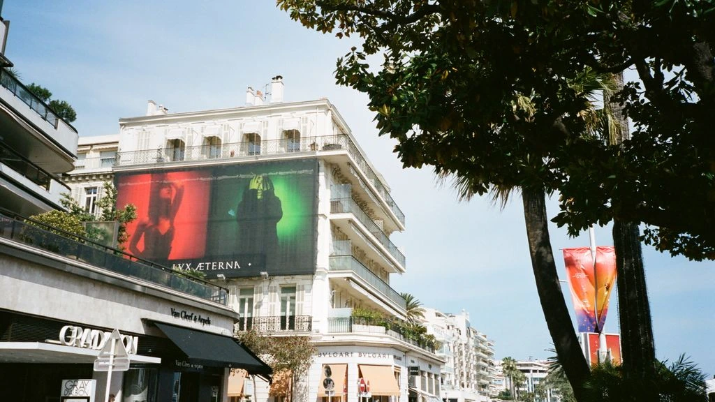 Duotone photograph of the Cannes Croisette promenade during the festival.